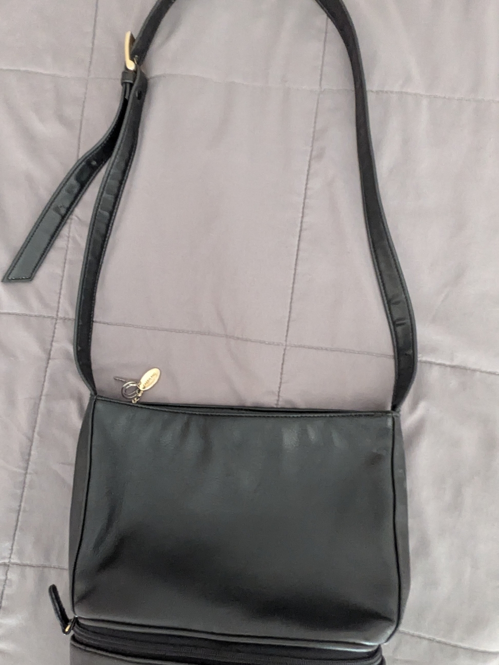 Black Leather Crossbody Bag with Gold Accent